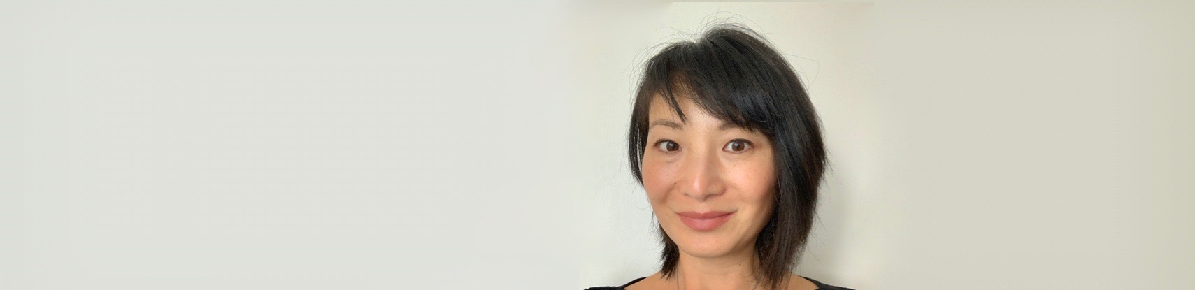 Female looking at camera, dark hair